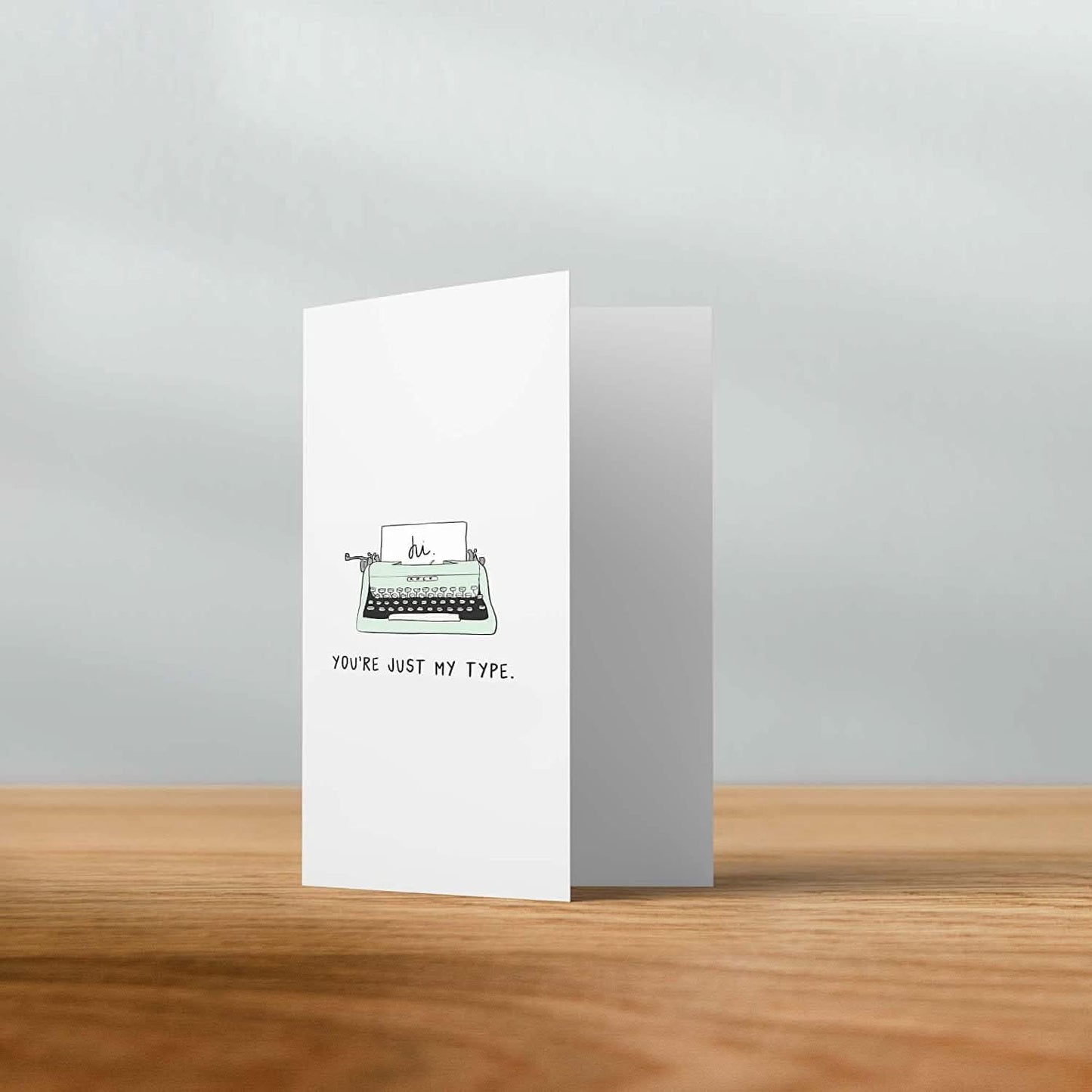 The "Just My Type" greeting card with a typewriter on it is the Just My Type Card by rockdoodles.