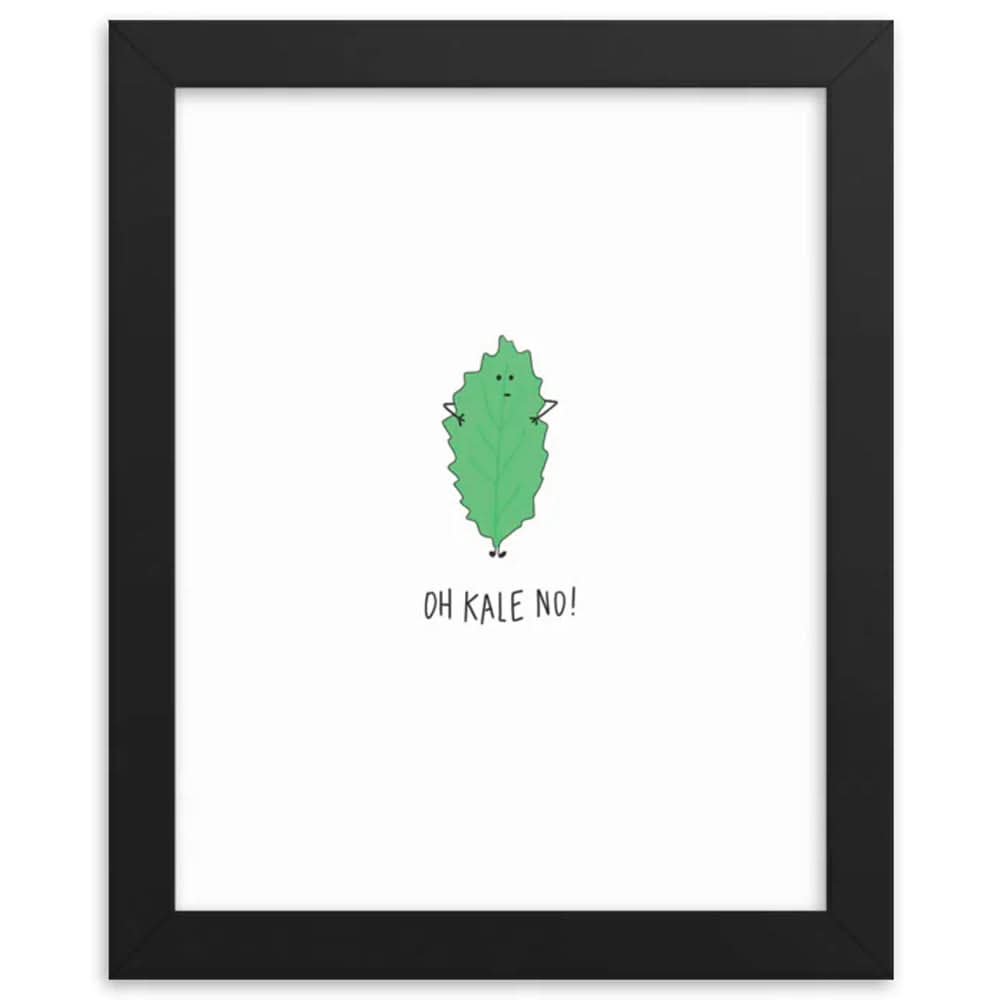 A black Kale No Print frame with a green leaf and text, displayed in a rockdoodles wood frame.
