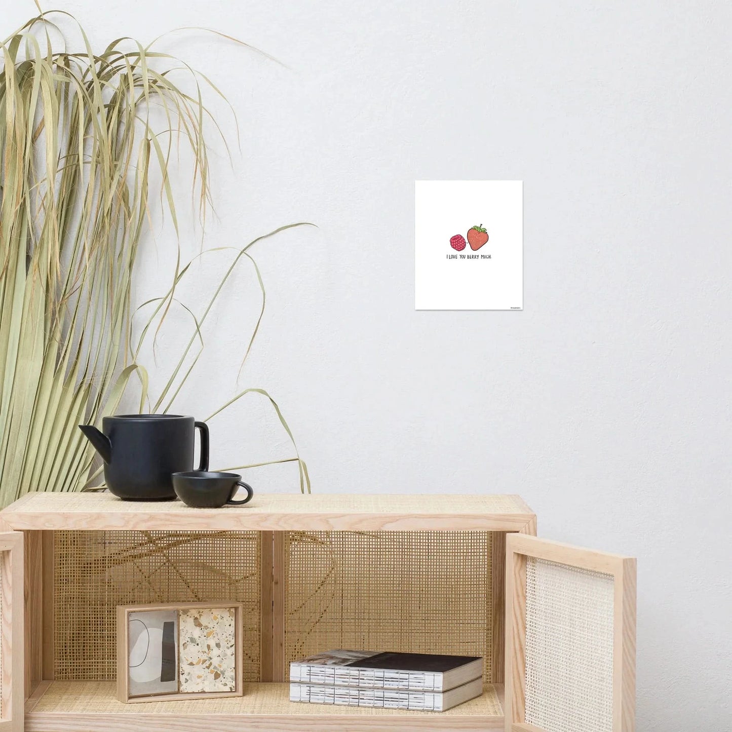 A living room with a rockdoodles Berry Much Print, hanging on the wall.