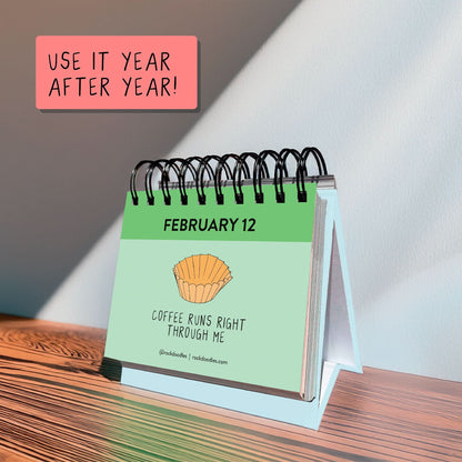 The rockdoodles A Pun A Day Perpetual Calendar shows February 12 with a coffee filter art and "Coffee runs right through me," plus a sticky note: "Use it year after year!"—ideal for fans of daily puns and clever gifts.