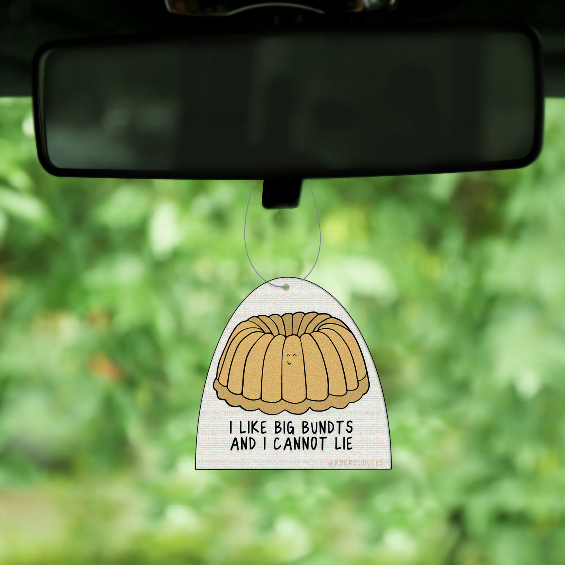 A Big Bundt (2 Pack) Punny Air Freshener - Vanilla Scent by rockdoodles with a cake on it.