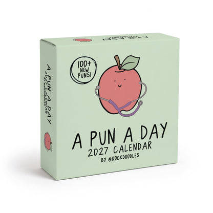 Light green box for the 2027 A Pun A Day Desktop Calendar by rockdoodles, featuring a cartoon apple with a stethoscope and "100+ new puns!" on the front. This plastic-free calendar is filled with pun-packed illustrations to brighten your day, every day.