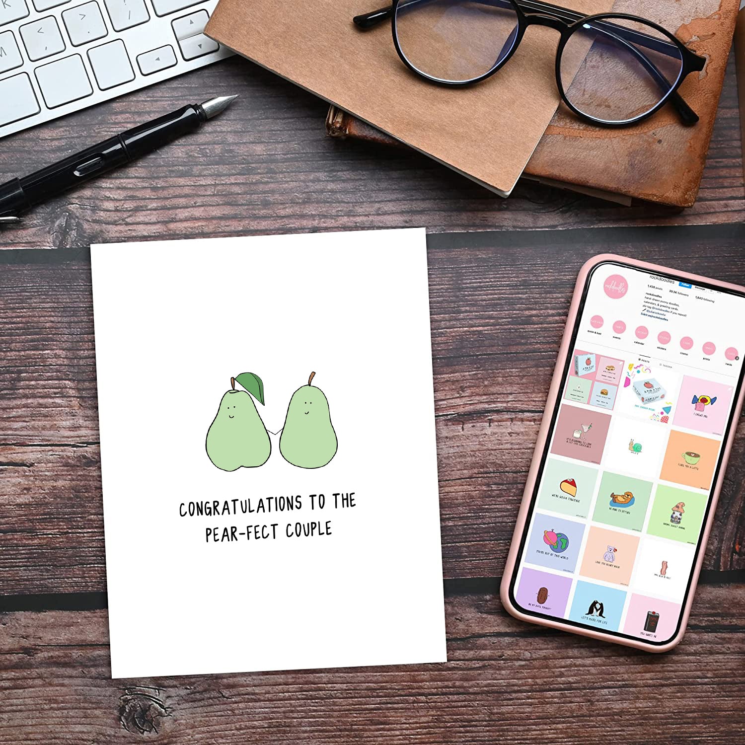 Congratulations on finding your rockdoodles Pear-Fect Couple Card! This unique card showcases two delightful pears alongside a cute phone illustration. It's the perfect way to celebrate and spread joy for any special occasion.